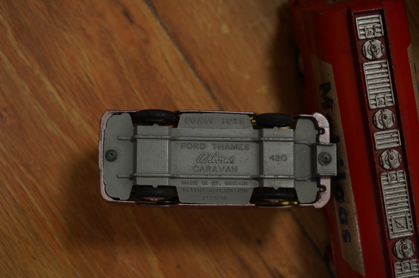 A collection of forty Corgi Toys and fourteen Matchbox Series diecast vehicles, including; The Man From Uncle Oldsmobile, a James Bond Aston Martin DB5 in gold, a Commer 5-ton truck with trailer and a selection of loads,